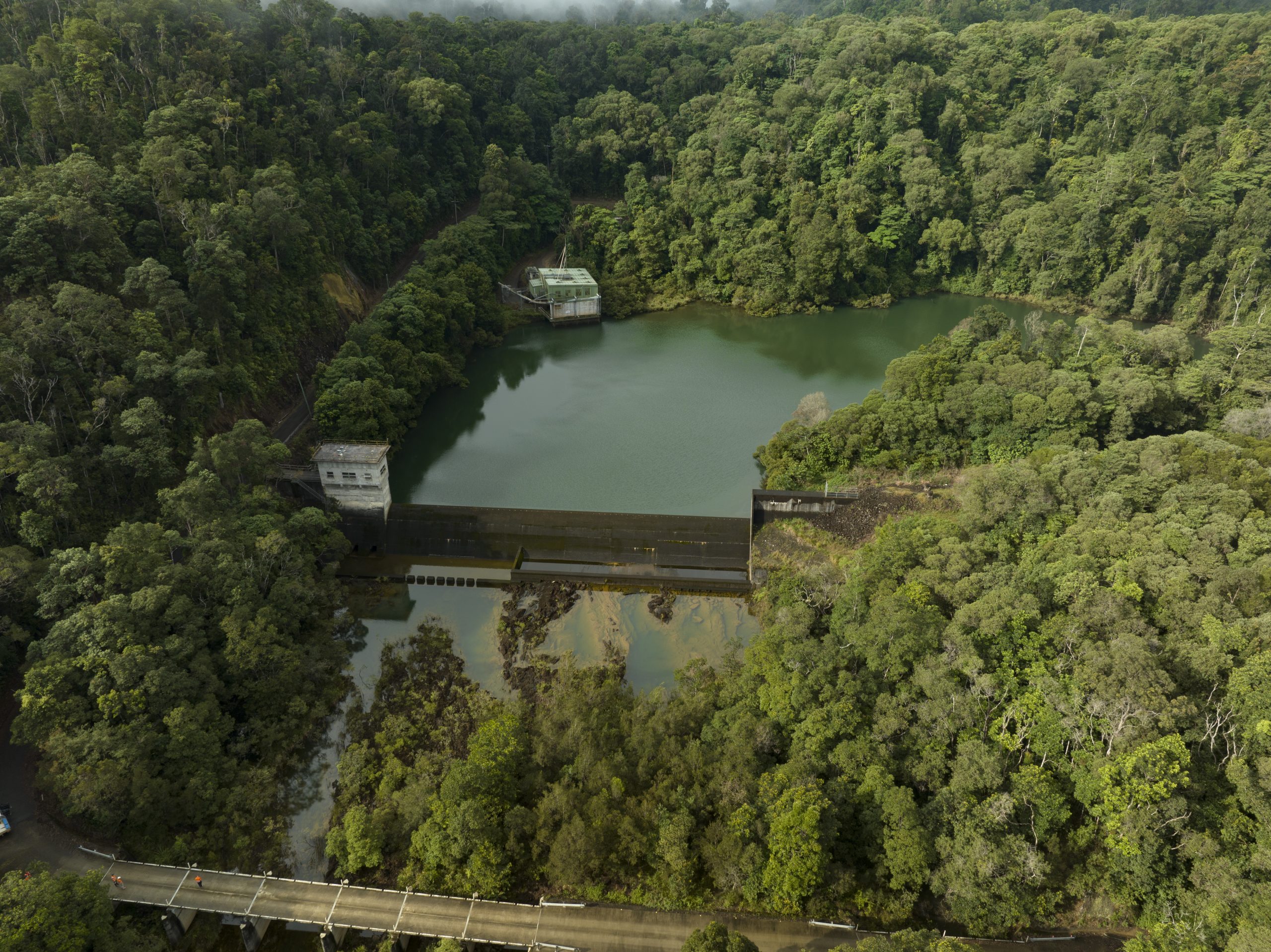 An aerial photograph of the Tully River that flows into Kareeya and Koombooloomba, with the dam in sight.